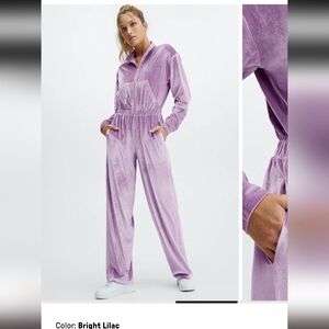 Fabletics velour zip-up wide leg onesie in Lavender.